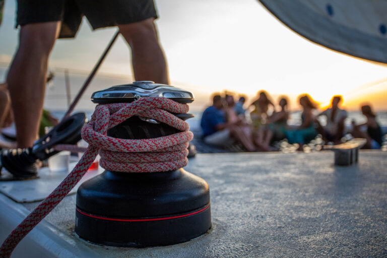 sunset sailing people