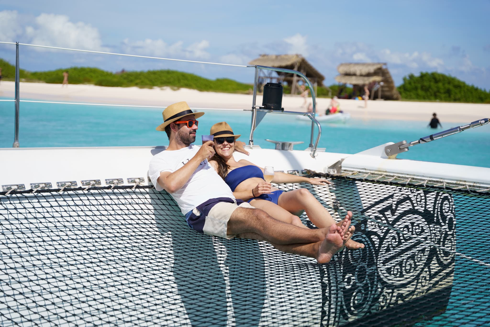 couple relaxing on sundeck boat