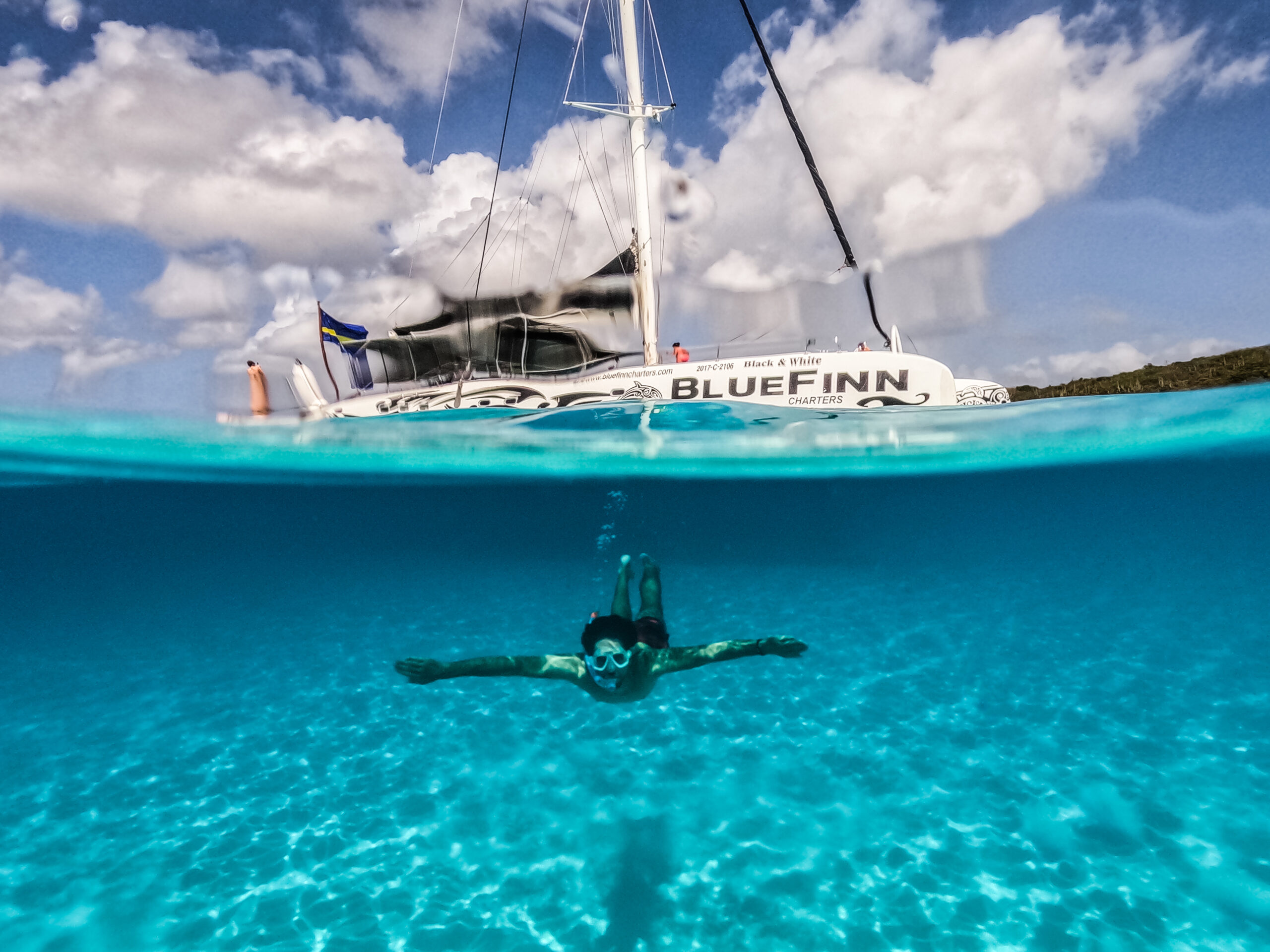 man snorkeling in the water