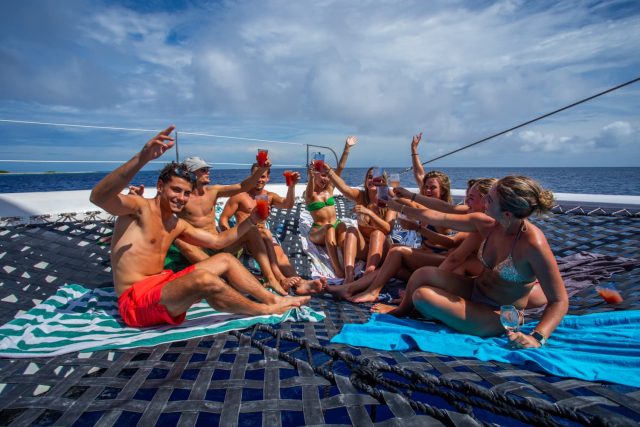 Group drinking on boat