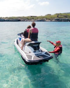 instructor with girls on jet ski