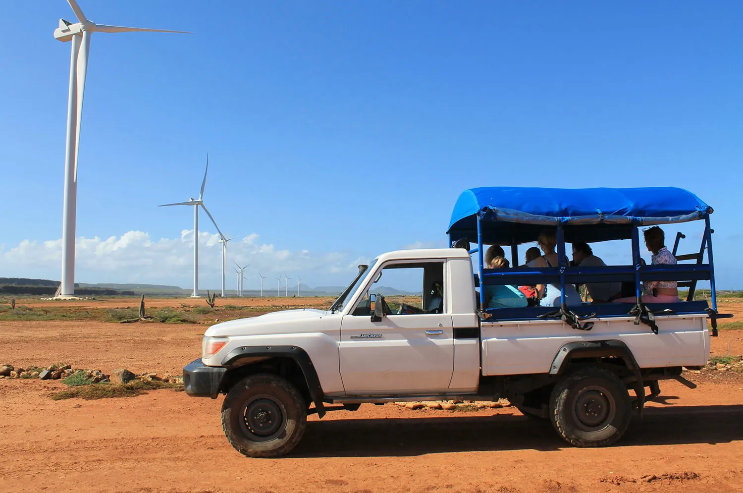 sightseeing on back of a truck