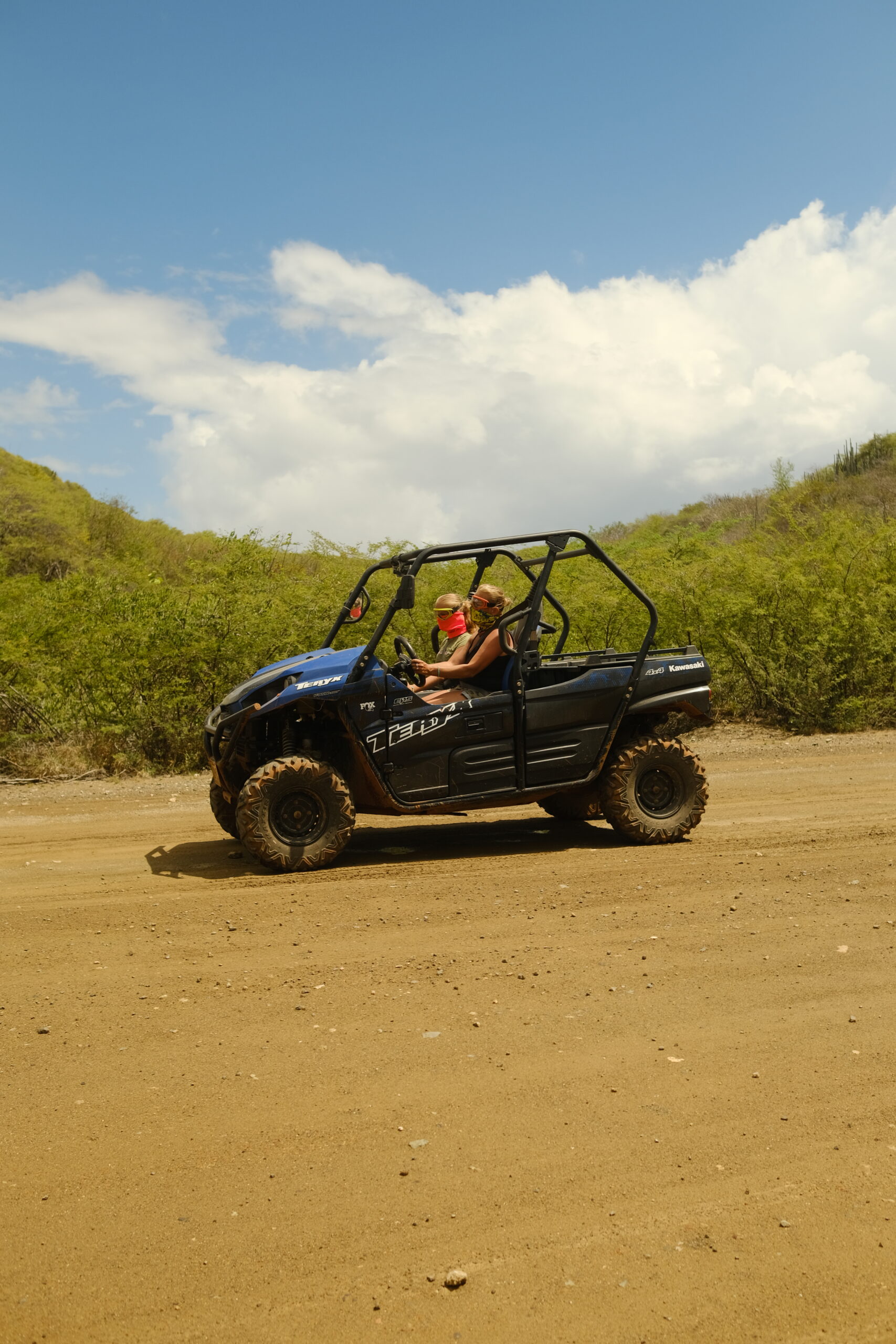 girls riding an atv