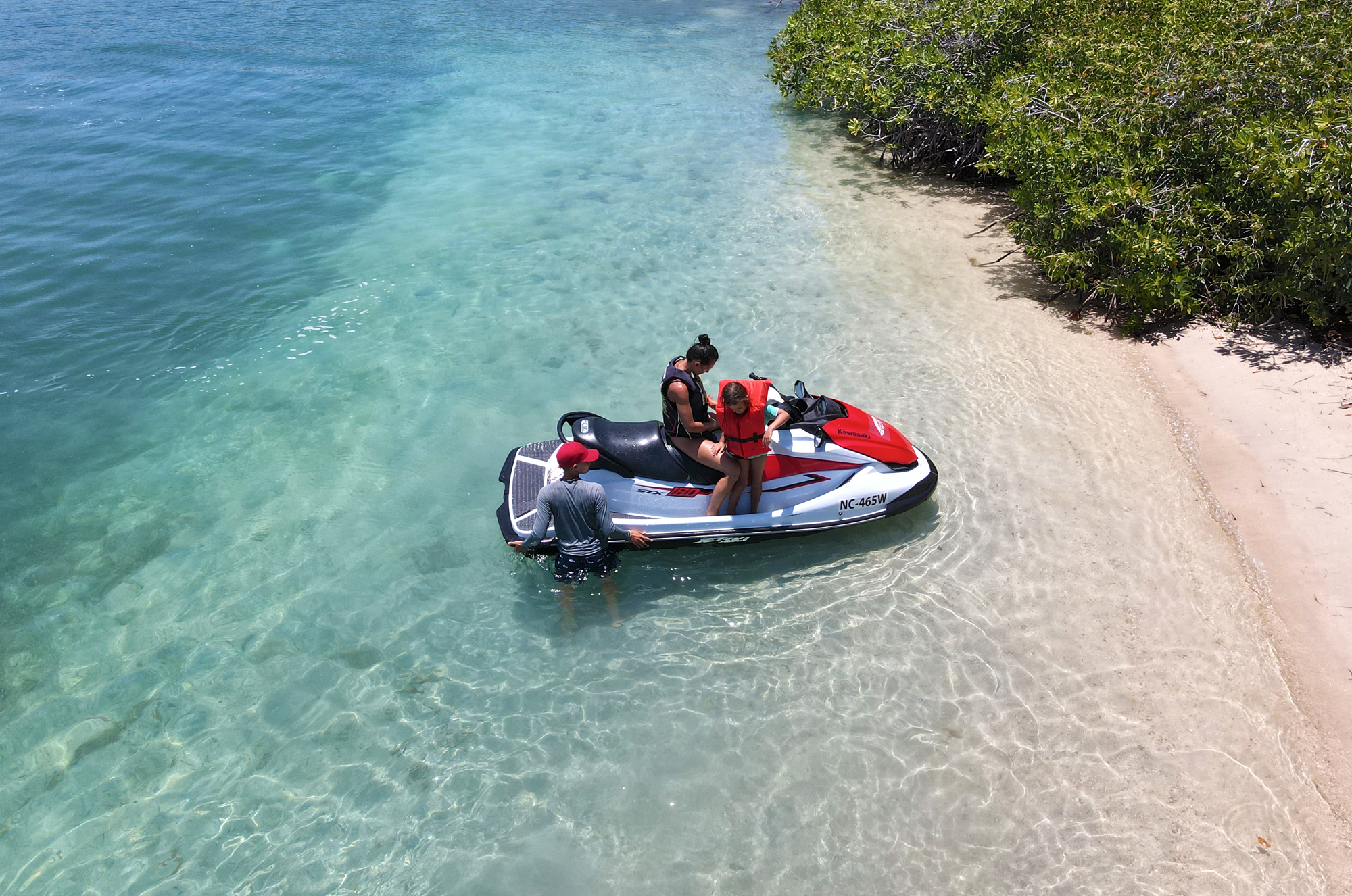family on jet ski