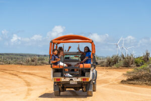 People in the back of a jeep