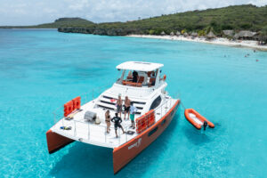 Topcat with people at sea